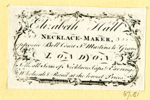 Ein altes Geschäftsprospekt mit einem Bild eines Schmuckherstellers und Text, der seine Dienstleistungen beschreibt.